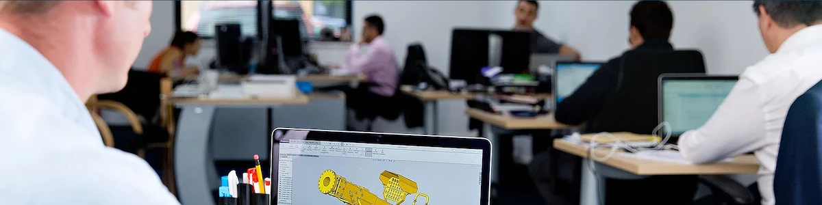 Engineers using solidworks in office